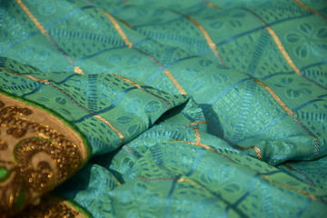 Blue fabric with traditional motifs
