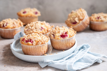 Fresh homemade delicious raspberry muffins on a table