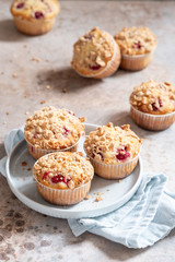 Fresh homemade delicious raspberry muffins on a table