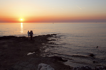 silhouette of woman on the beach