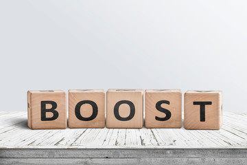 Boost sign on a wooden table in a bright room