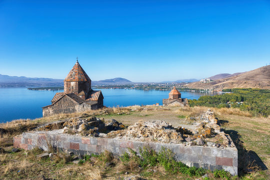 Scenic view of an old Sevanavank church in Sevan, Armenia on sunny  day, blue sky