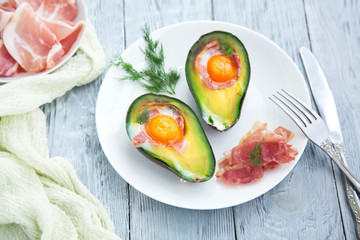 healthy Breakfast with avocado on wooden table