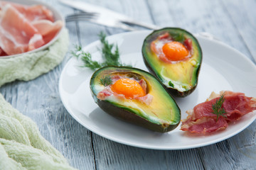 healthy Breakfast with avocado on wooden table