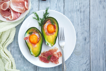 healthy Breakfast with avocado on wooden table