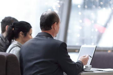 concept of business meetings.A team of employees uses a laptop for work