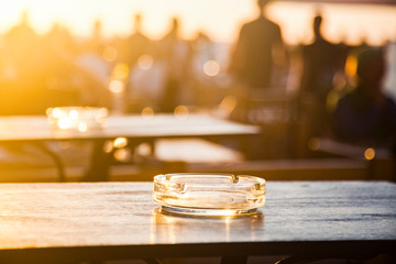 sunset bar by the beach - focus on table