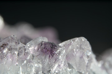 Quartz also called deep quartz photographed in studio in front of black background in Marco mode 