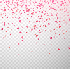 Red and pink paper confetti in shape of hearts on transparent background for St. Valentine's Day.