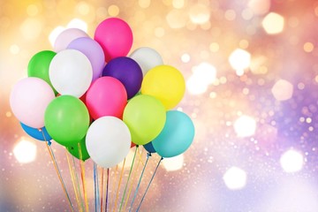 Bunch of colorful balloons on background