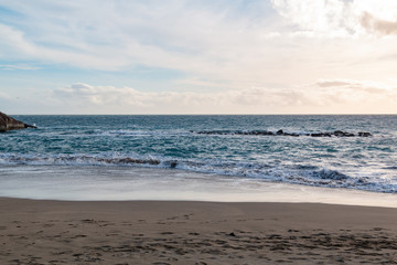 Fototapeta na wymiar Front view of ocean black sand beach Tenerife