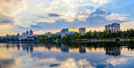 Fototapeta na wymiar View of the evening embankment of the Kalmius river in Donetsk 2