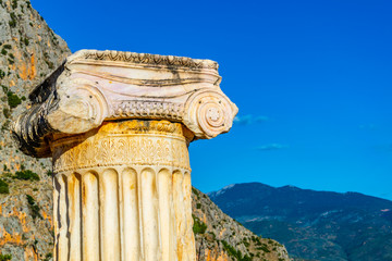an old column situated at the ancient Delphi site in Greece