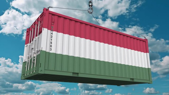 Loading container with flag of Hungary. Hungarian import or export related conceptual 3D animation