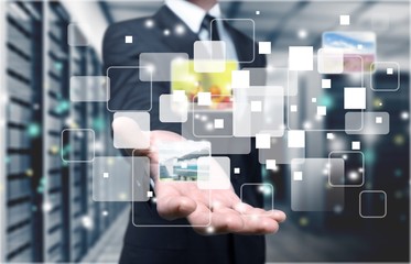 Businessman and  analytics symbol on  background