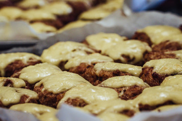 Closeup View of Sliced Bread Spread on the Table with Ingredients on them for Small Burgers - Kitchen Set, Concept of the Holiday Evening Dinner Table