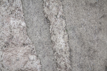 Gray rough texture of natural stone. Horizontal gray background. Suitable for design.