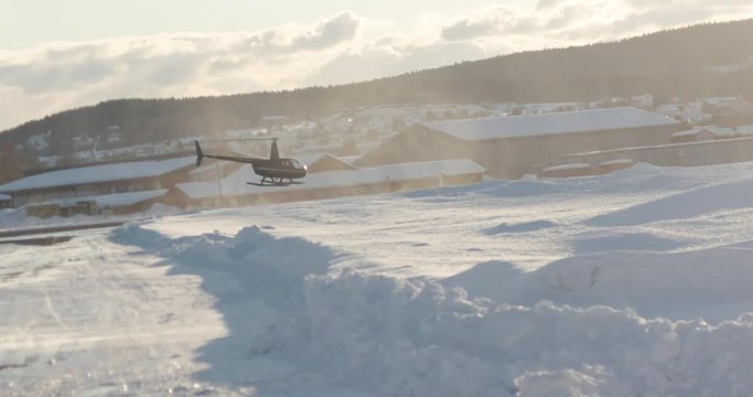 Helicopter takeoff snowstorm