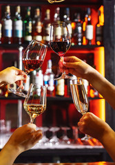 glasses of red and white wine in the bar