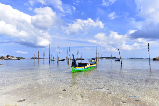 Small fishing boats at the beach of Tanjung Kelayang in Belitung Island, Indonesia