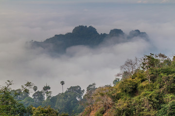 Mist covering the landscape around Mt Zwegabin near Hpa An, Myanmar