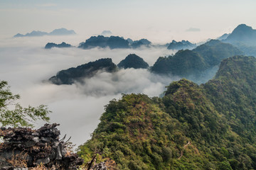 Mountains around Mt Zwegabin in a mist near Hpa An, Myanmar