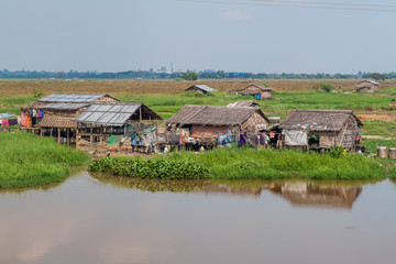 Fields and houses in a suburbs of Yangon, Myanmar