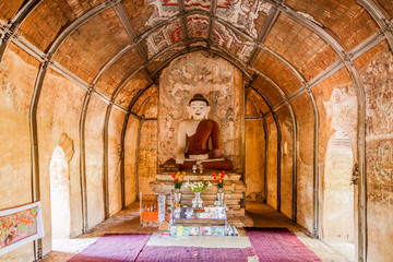 Buddha statue in Upali Thein temple in Bagan, Myanmar.