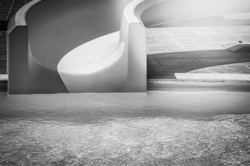 Stylishly interesting water slide in the pool near the sea on nature background
