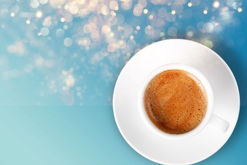 Conceptual image of cup of coffee and modern city concept