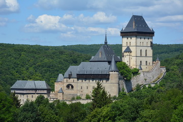 Fototapeta premium Karlstejn Castle is a large Gothic castle founded 1348 CE by Charles IV, Holy Roman Emperor-elect and King of Bohemia.