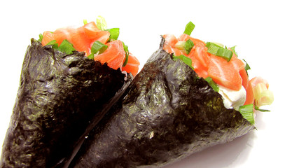 A close up of salmon temaki against a white background. Sushi temaki Salmon isolated on white...