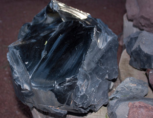 Raw Obsidian Rock with cross section in Mexico City was usful to do arrows