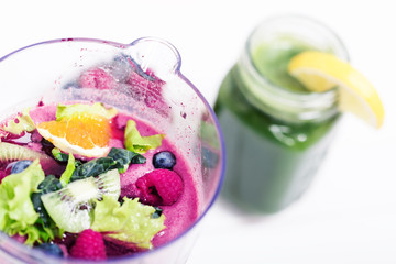  Kiwi, raspberry and orange slices blended for tasty breakfast