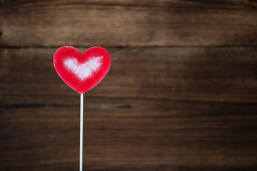 red heart on wooden background. Valentine's Day. celebration