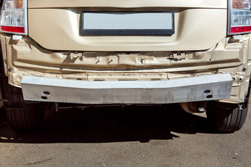 Close-up of a car without a bumper, rear view of a car after an incident.