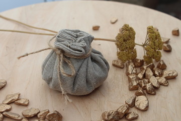 Cotton bag full of gold symbolizing richness and prosperity