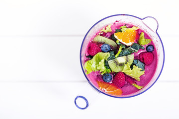 Fruits and berries in blender, macro