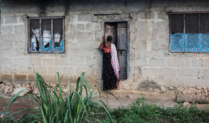 Woman at a door, Africa 