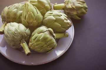 Fototapeta premium Fresh textured green artichoke flower