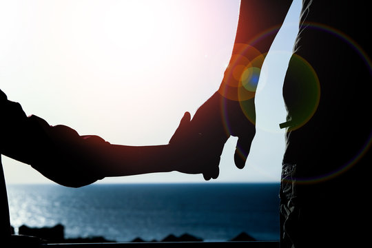 Beautiful Arms Of The Parent And Child Silhouette Of The Background