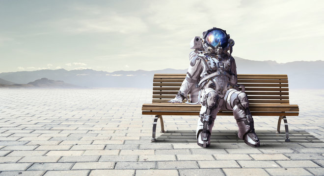 Rocketman on bench. Mixed media