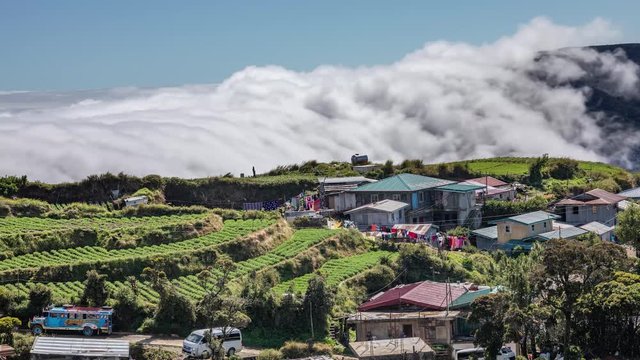 Sea of clouds on a town located on Mount Pulag, the third highest peak in Philippines.