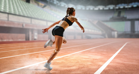 Obraz premium Sportswoman running race. Mixed media