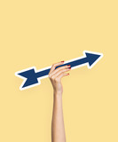 Hand holding an arrow clipart