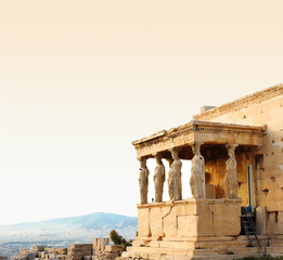 Acropolis, Erectheion, caryatids with panoramic view of the Athens, Greece