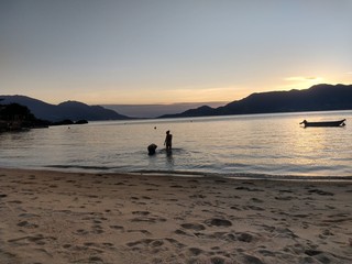 Fototapeta na wymiar fishing at sunset