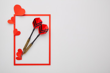 Valentine's day red darts and paper heart