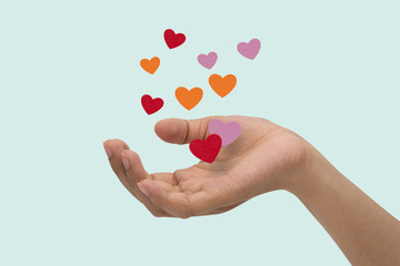 Flying hearts from hands, Valentine's Day, love concept,