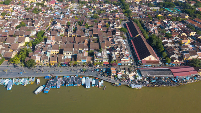 Panorama of Hoian market. Aerial view of Hoi An old town or Hoian ancient town. Royalty high-quality free stock photo image top view of Hoai river and boat traffic in HoiAn market. Hoian city, Vietnam